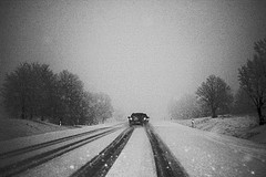 Car Driving In The Snow